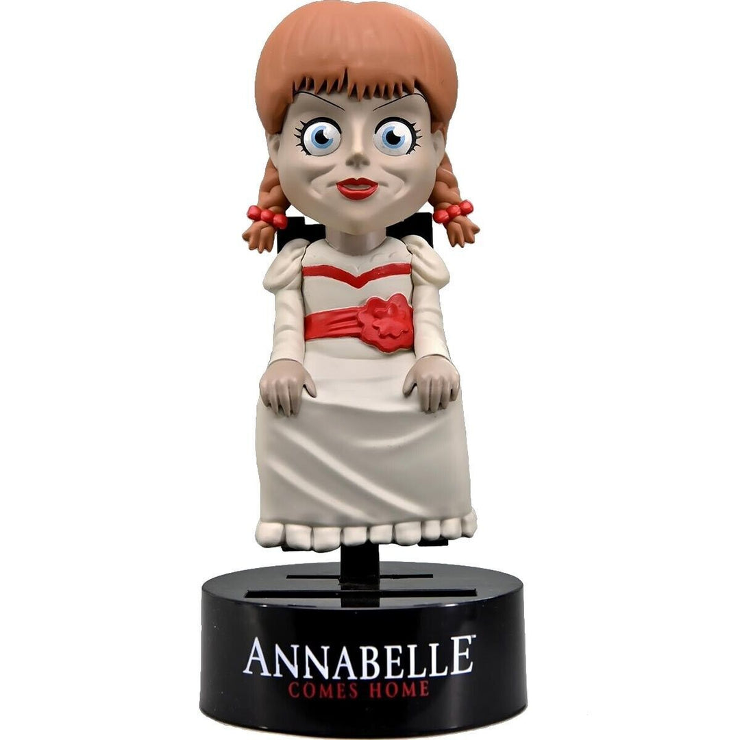 Unveiling the Haunting Tale of NECA's Annabelle Solar-Powered Body Knocker