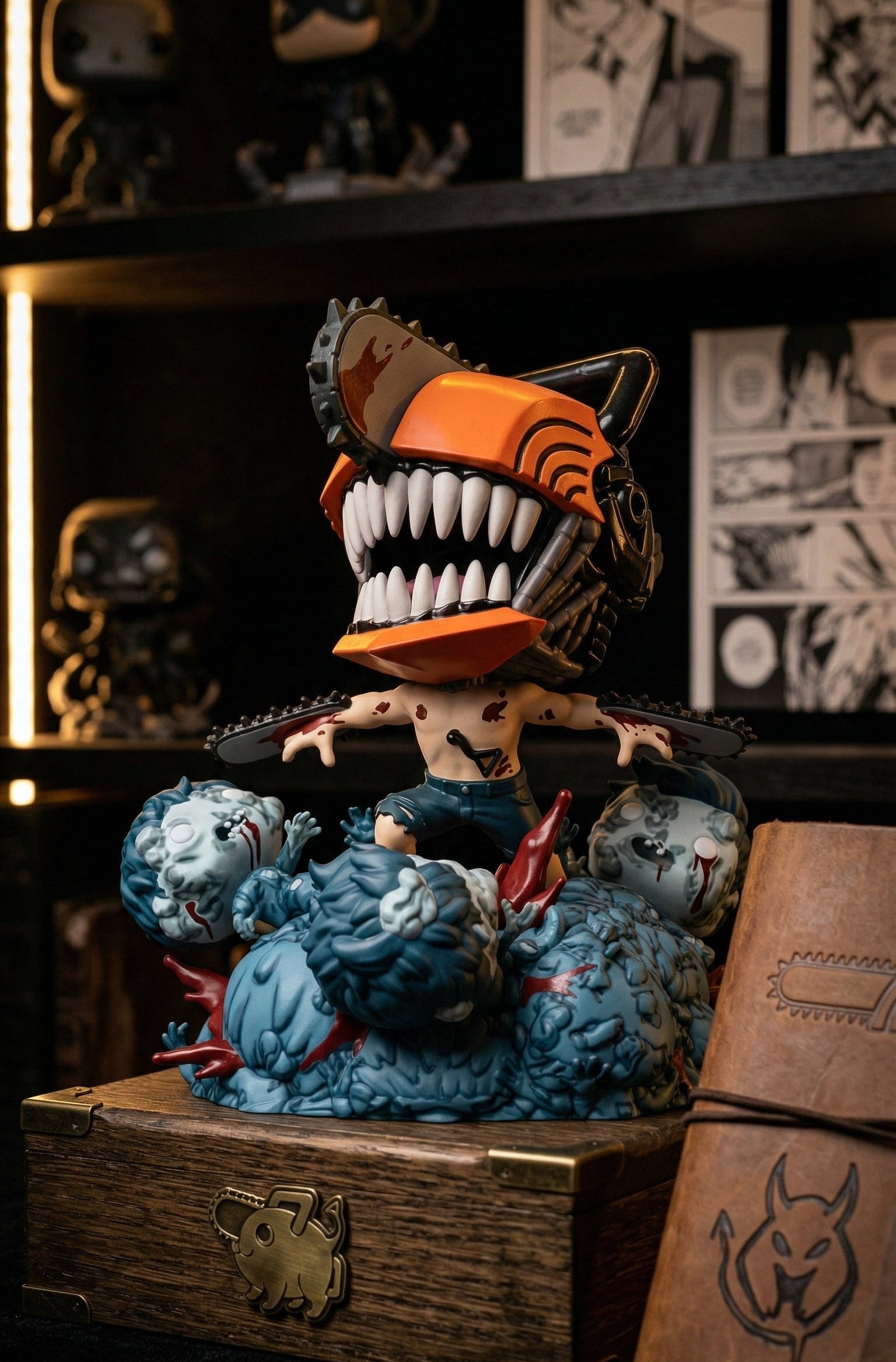 Stylized figure with orange head and blue body on a wooden box with a dark background